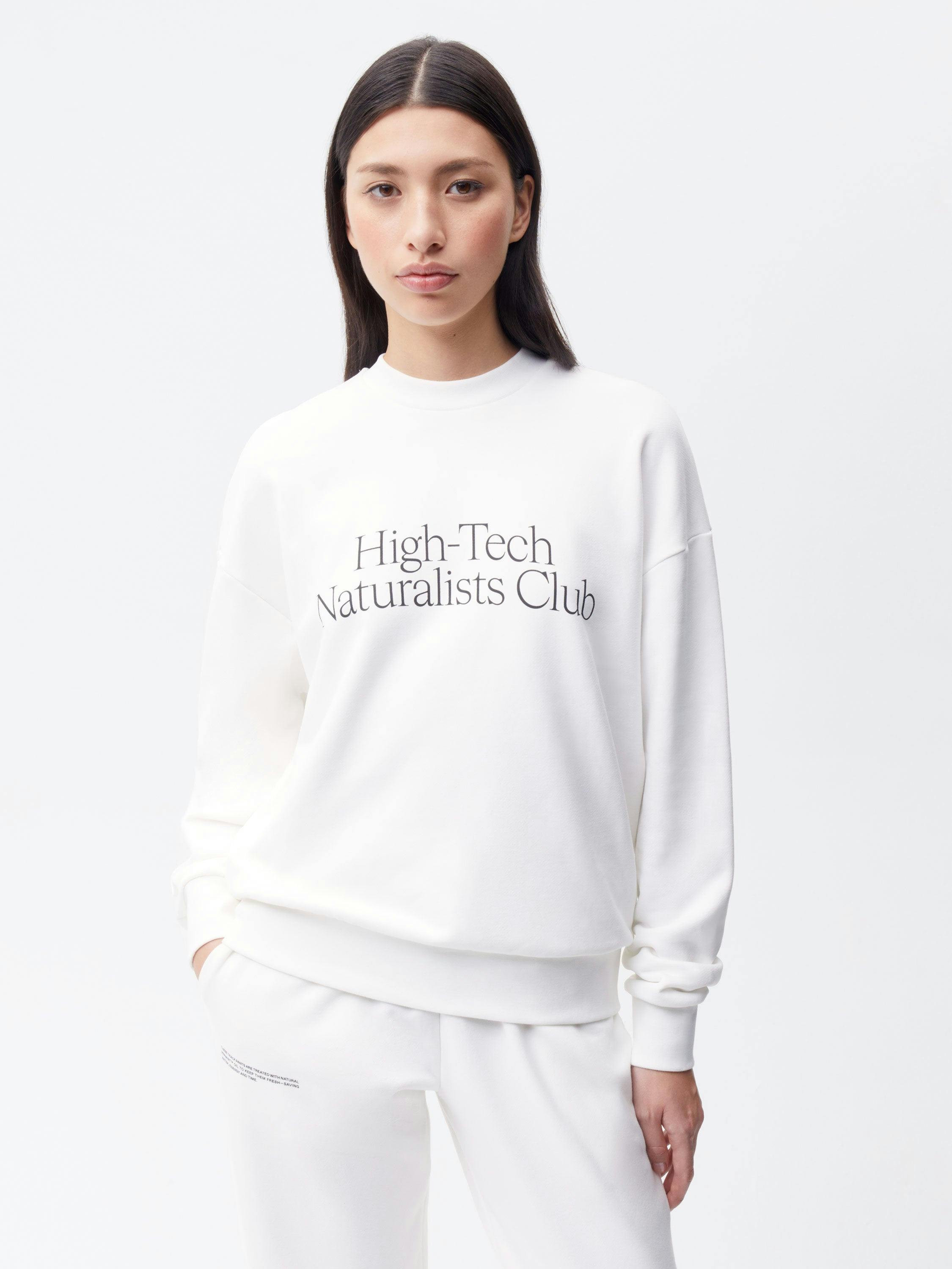 https://cdn.shopify.com/s/files/1/0035/1309/0115/files/High-Tech-Naturalist-Club-365-Sweatshirt-Off-White-Female-1-NEW.jpg?v=1689160754