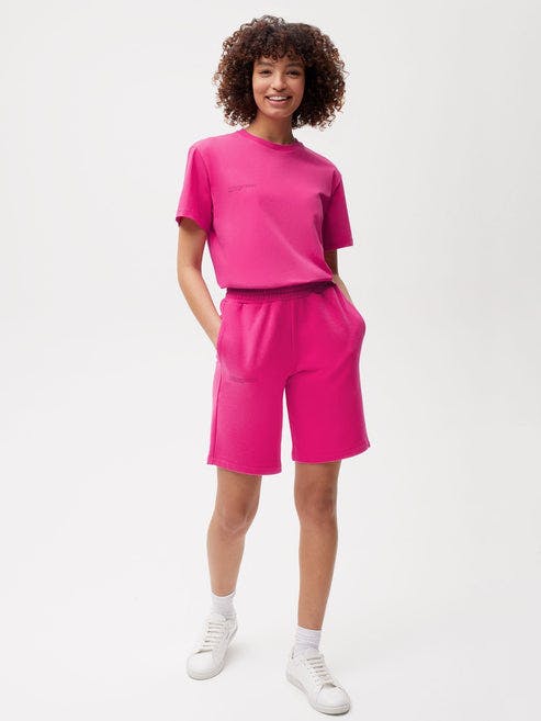 https://cdn.shopify.com/s/files/1/0035/1309/0115/products/365-Organic-Cotton-Long-Shorts-Foxglove-Pink-Female-1.jpg?v=1662476218&width=493