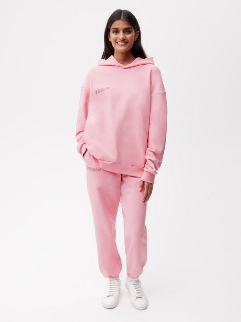 https://cdn.shopify.com/s/files/1/0035/1309/0115/products/365-Organic-Cotton-Track-Pant-Sakura-Pink-Female-1.jpg?v=1662475561&width=493