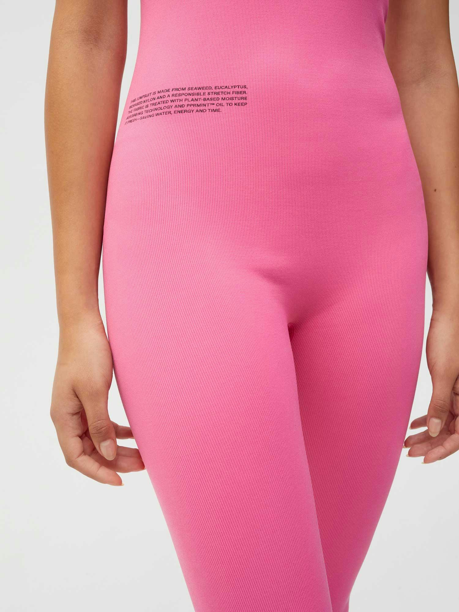 https://cdn.shopify.com/s/files/1/0035/1309/0115/products/Activewear-Womens-Jumpsuit-Flamingo-Pink-3_e5896447-7c58-4645-a3d5-6737e95199dd.jpg?v=1662475882