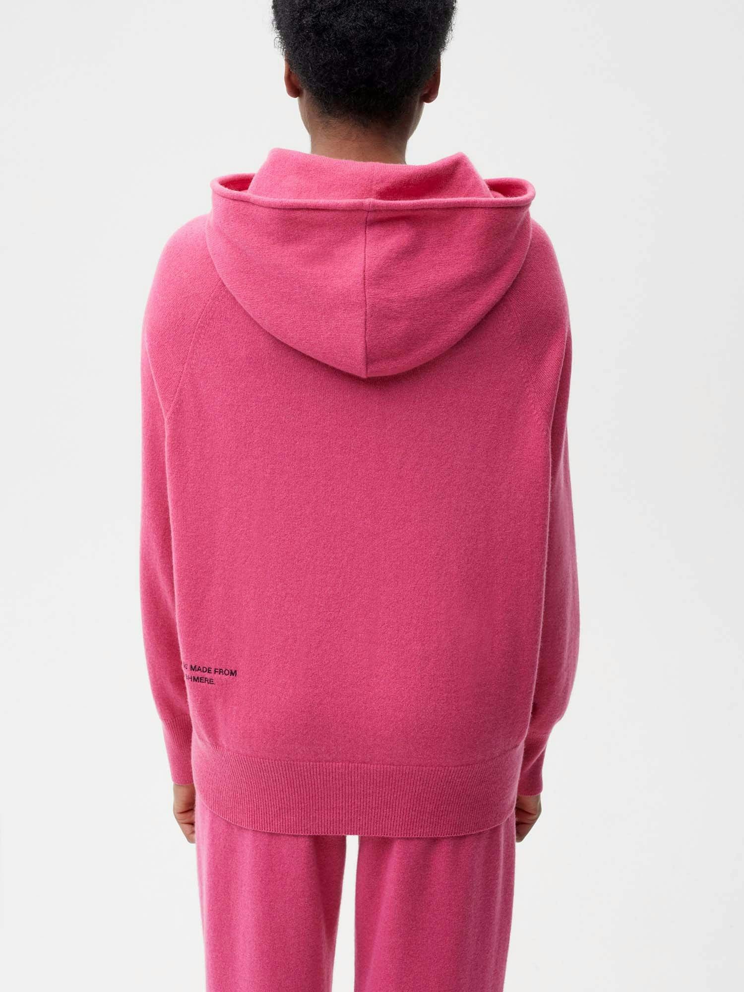 https://cdn.shopify.com/s/files/1/0035/1309/0115/products/Cashmere-Hoodie-Flamingo-Pink-Female-Model-2.jpg?v=1671726306