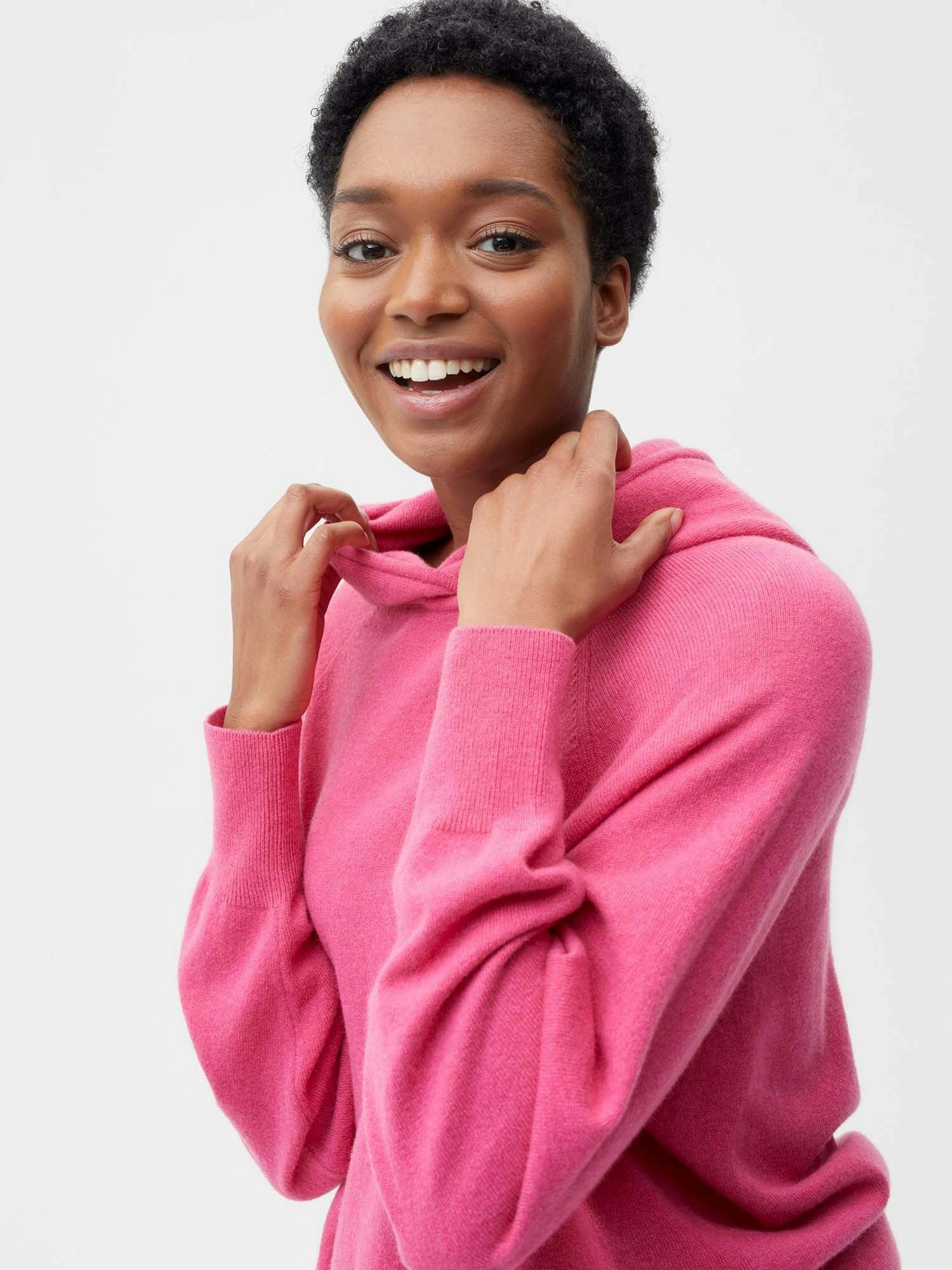 https://cdn.shopify.com/s/files/1/0035/1309/0115/products/Cashmere-Hoodie-Flamingo-Pink-Female-Model-4.jpg?v=1671726306