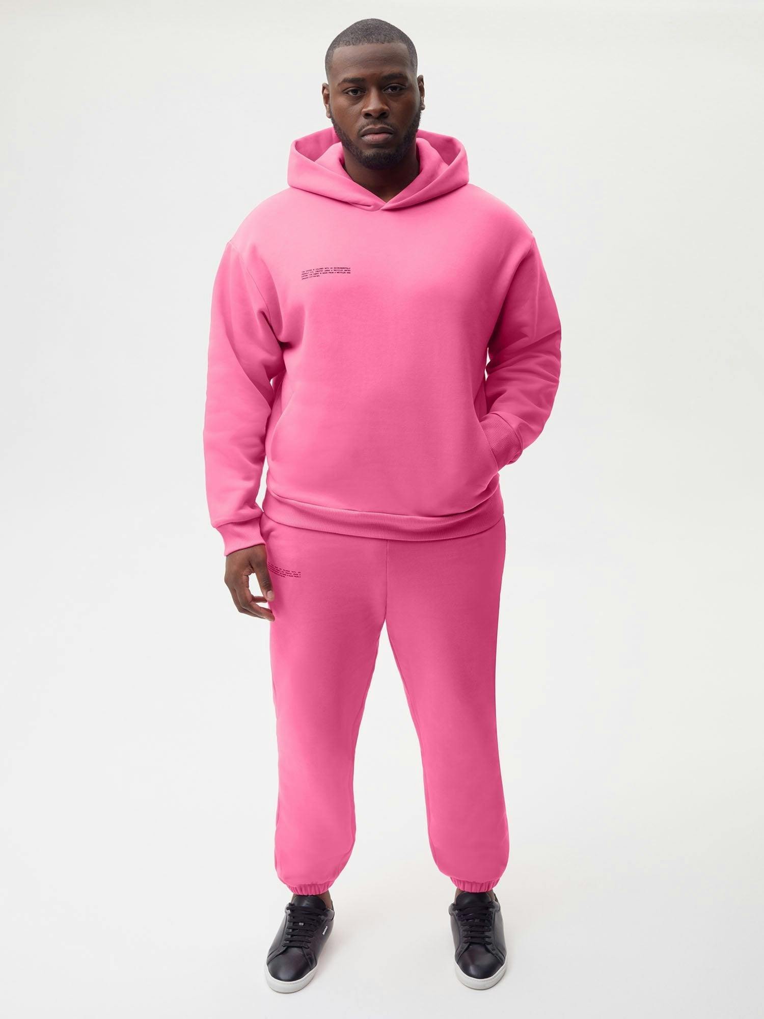 https://cdn.shopify.com/s/files/1/0035/1309/0115/products/Heavyweight-Recycled-Cotton-Hoodie-Flamingo-Pink-Male-1_e6df2e1d-e8f3-41d3-a12a-ed7487d083f1.jpg?v=1671545317