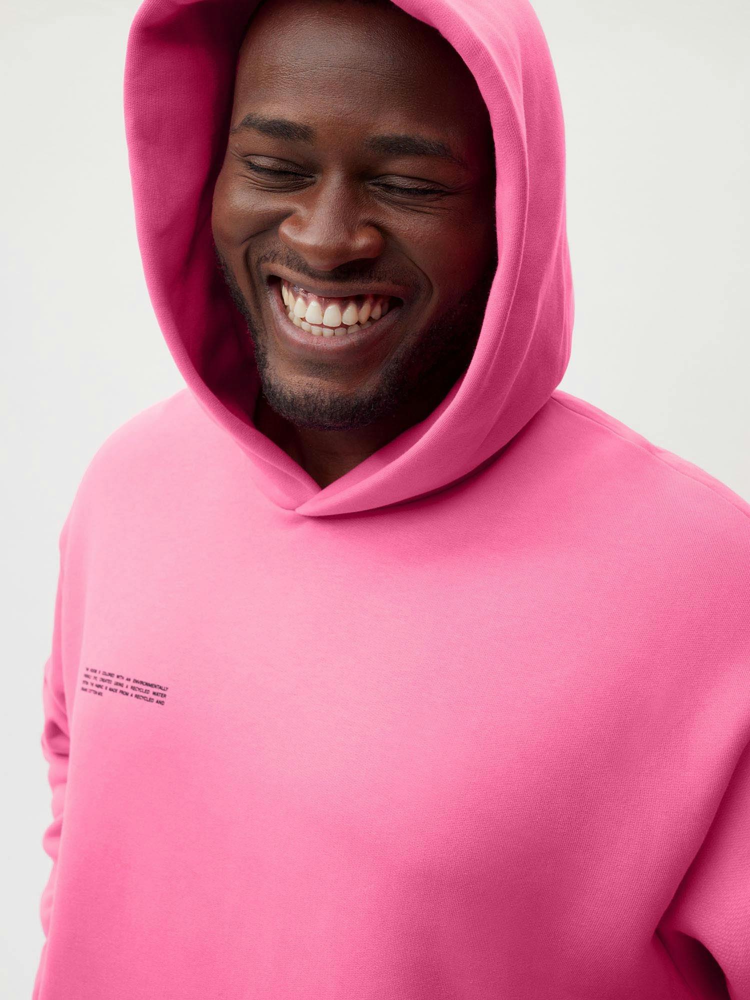 https://cdn.shopify.com/s/files/1/0035/1309/0115/products/Heavyweight-Recycled-Cotton-Hoodie-Flamingo-Pink-Male-4_2dfdaa0d-19c1-4a91-afd3-563d463e29be.jpg?v=1671545317