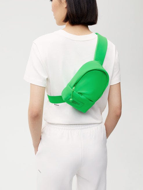 https://cdn.shopify.com/s/files/1/0035/1309/0115/products/Nylon-Padded-Mini-Backpack-Jade-Green-Female-1.jpg?v=1662476244&width=493