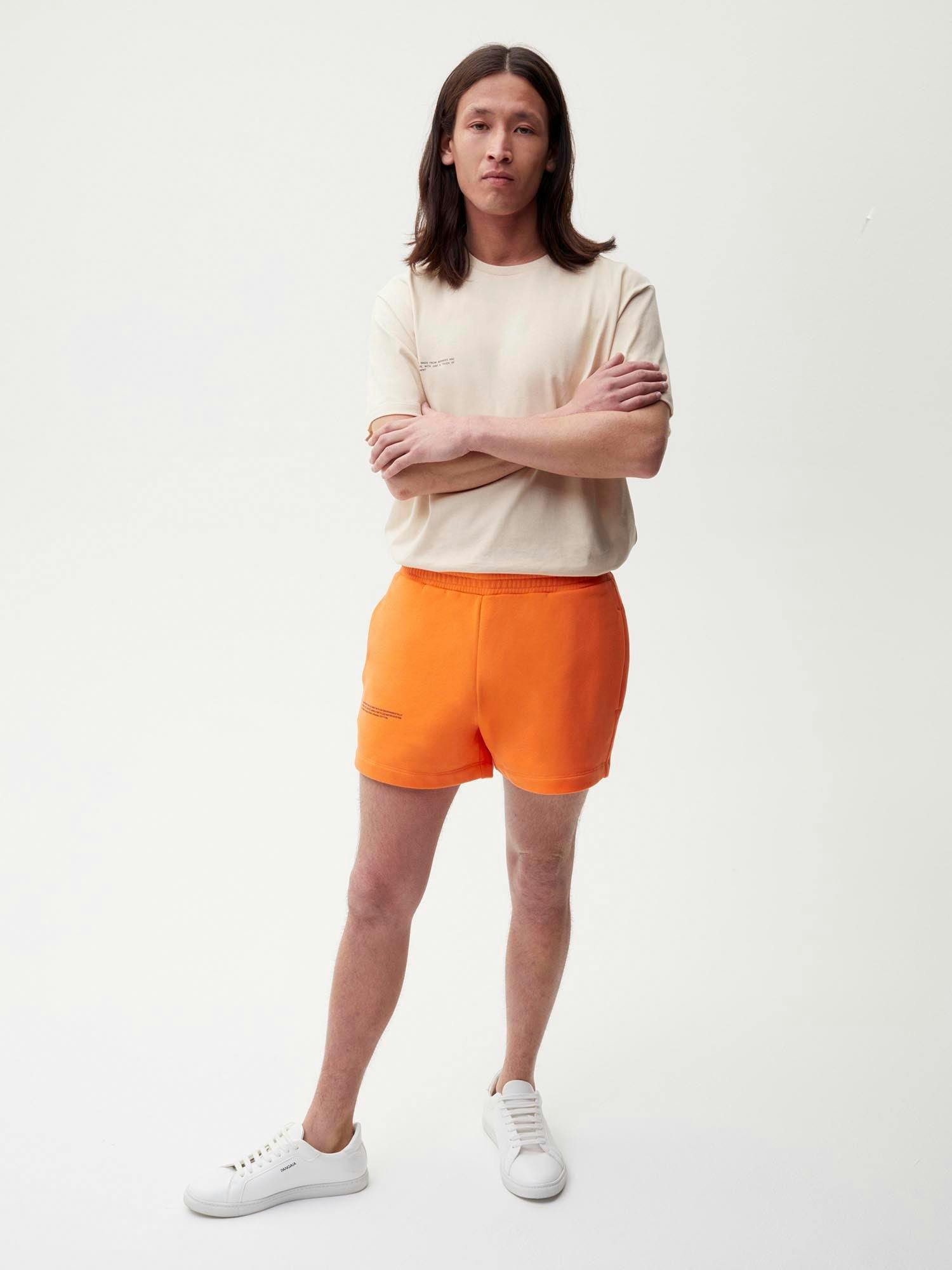 https://cdn.shopify.com/s/files/1/0035/1309/0115/products/Organic-Cotton-Shorts-Persimmon-Orange-Male-1.jpg?v=1662475637