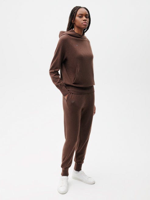 https://cdn.shopify.com/s/files/1/0035/1309/0115/products/Recycled-Cashmere-Core-Track-Pants-Chestnut-Brown-Female-1.jpg?v=1663947790&width=493