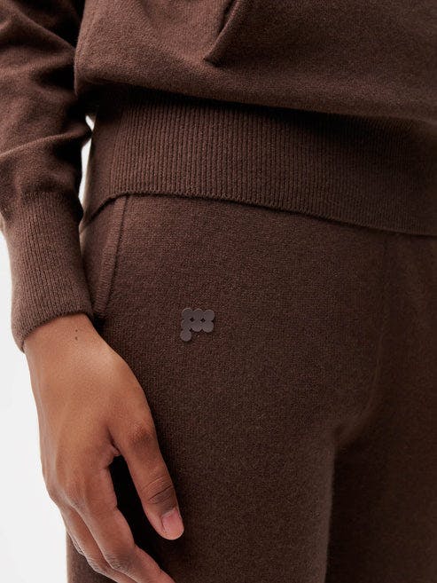 https://cdn.shopify.com/s/files/1/0035/1309/0115/products/Recycled-Cashmere-Core-Track-Pants-Chestnut-Brown-Female-2.jpg?v=1663947790&width=493