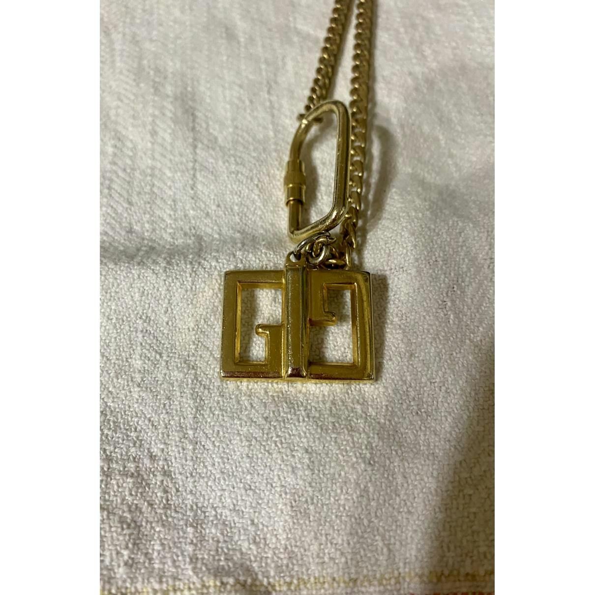https://images.vestiairecollective.com/cdn-cgi/image/q=75,f=auto,/produit/gold-gold-plated-gg-running-gucci-necklace-35343107-4_2.jpg?secret=VC-e9eee96a-a819-4431-ad12-d066be2626ef