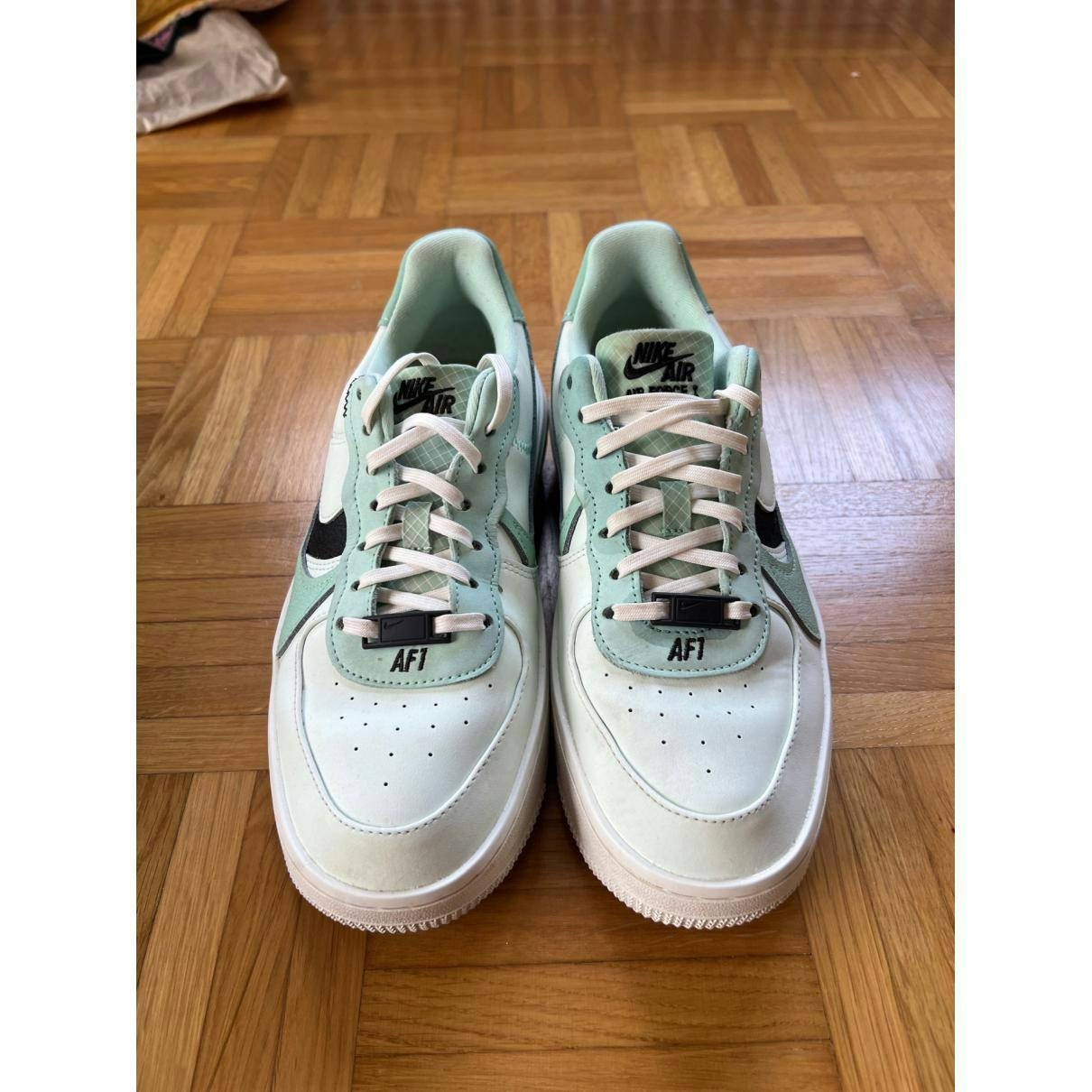 https://images.vestiairecollective.com/cdn-cgi/image/q=75,f=auto,/produit/green-leather-air-force-1-nike-trainers-34609810-6_3.jpg?secret=VC-e9eee96a-a819-4431-ad12-d066be2626ef