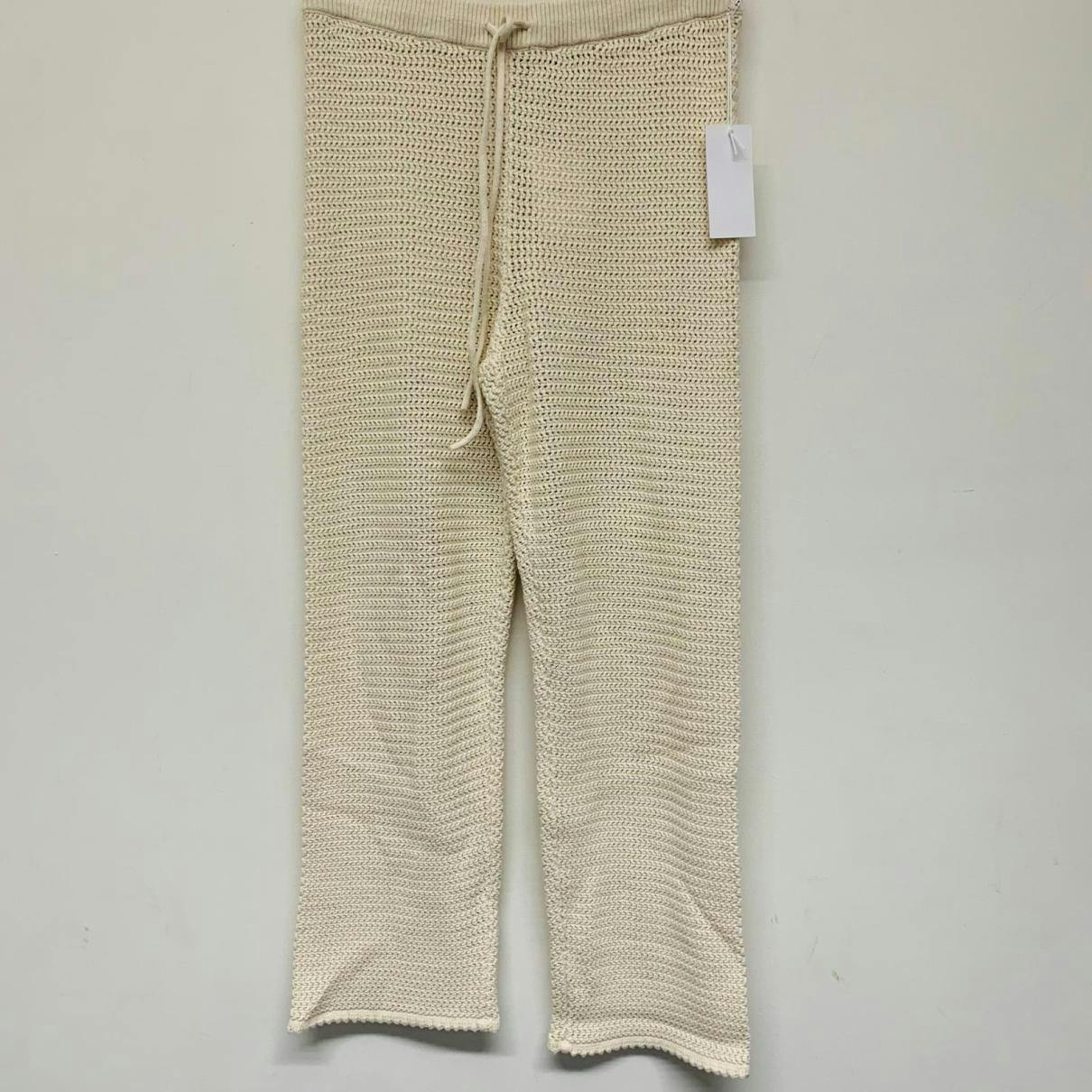 https://images.vestiairecollective.com/cdn-cgi/image/q=75,f=auto,/produit/white-synthetic-reformation-trousers-35136158-10_2.jpg?secret=VC-e9eee96a-a819-4431-ad12-d066be2626ef