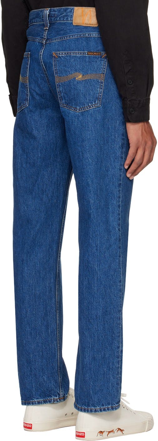 https://img.ssensemedia.com/images/b_white,g_center,f_auto,q_auto:best/222078M186081_3/nudie-jeans-blue-rad-rufus-jeans.jpg