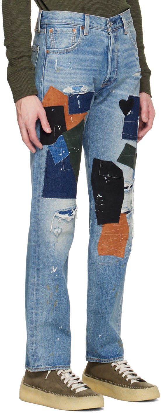 https://img.ssensemedia.com/images/b_white,g_center,f_auto,q_auto:best/231099M186024_2/levis-indigo-501-93-patchwork-jeans.jpg